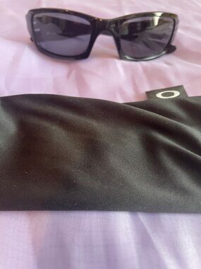 Kids Oakley Black Polarized Rectangular Sunglasses with Black Soft Pouch